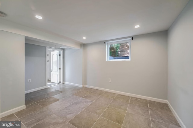 spare room with tile patterned flooring