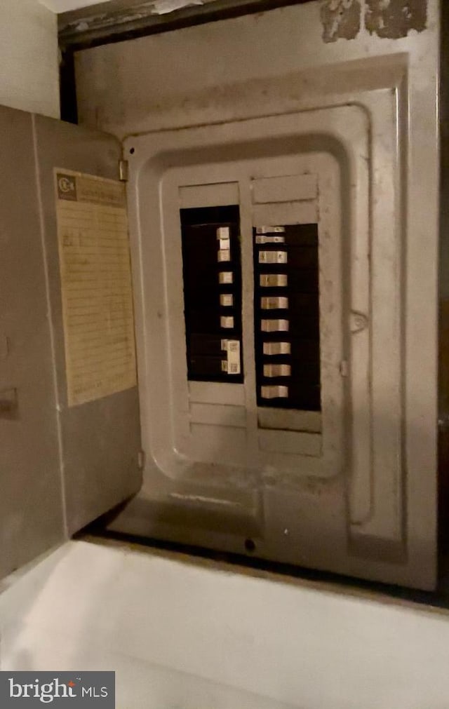 utility room featuring electric panel