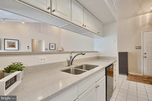 kitchen with white cabinetry, black dishwasher, sink, and light tile patterned floors