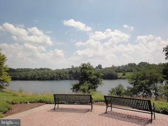 exterior space with a water view