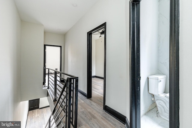 hallway featuring light hardwood / wood-style flooring