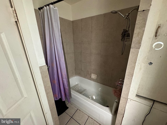 bathroom featuring shower / tub combo and tile patterned flooring