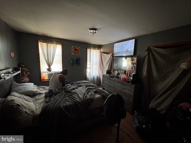 bedroom featuring cooling unit