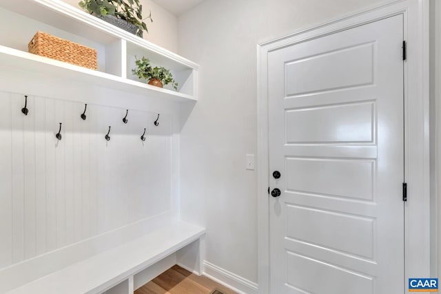 mudroom with hardwood / wood-style floors