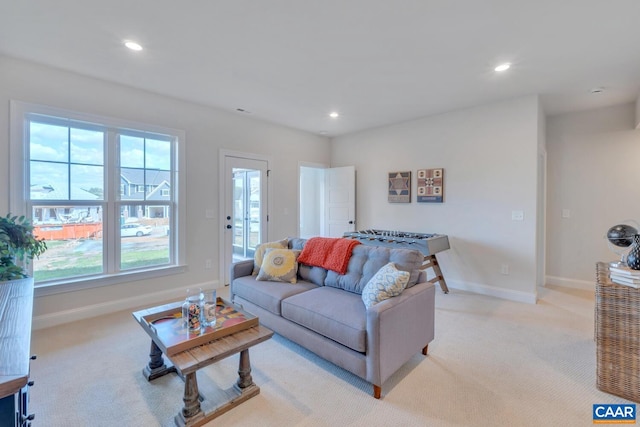 living room featuring light colored carpet