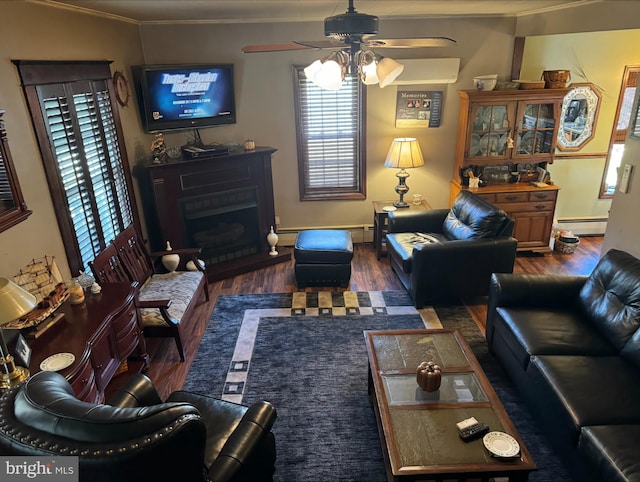 living room featuring a baseboard heating unit, ceiling fan, vaulted ceiling, dark wood-type flooring, and crown molding