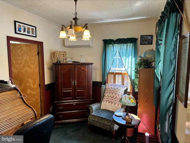 living area featuring ornamental molding, an inviting chandelier, and dark colored carpet