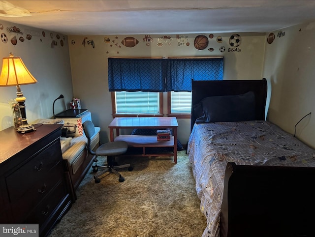 bedroom featuring carpet