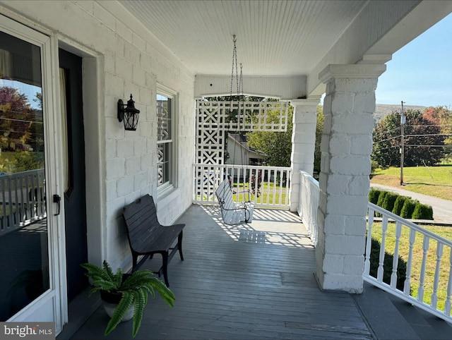 wooden terrace with covered porch