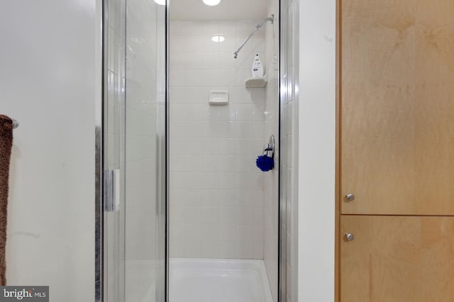 bathroom featuring walk in shower