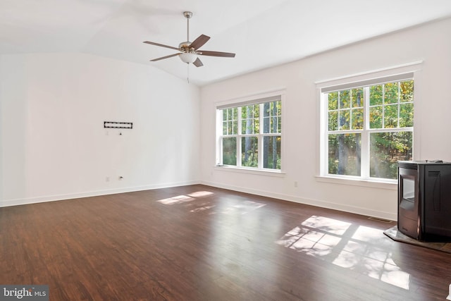 unfurnished living room with vaulted ceiling, dark hardwood / wood-style flooring, and ceiling fan