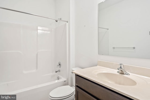 full bathroom featuring shower / tub combination, vanity, and toilet