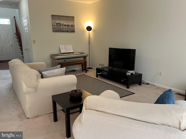 living room featuring light colored carpet