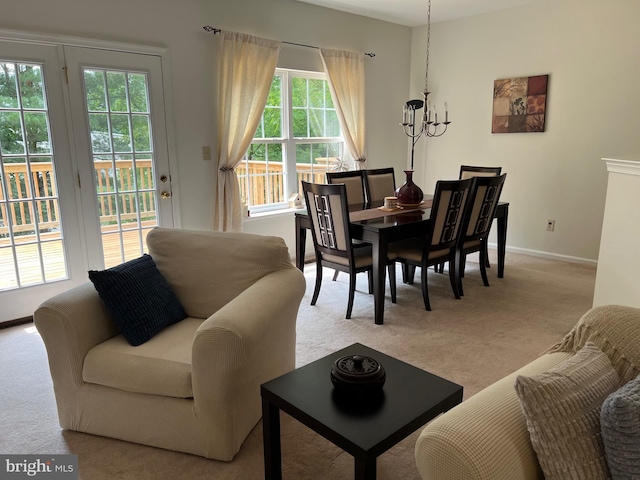 interior space with a wealth of natural light and a chandelier