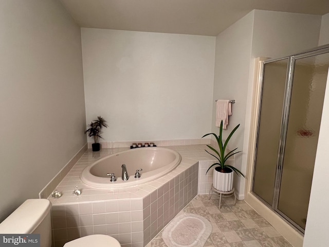 bathroom with toilet and independent shower and bath