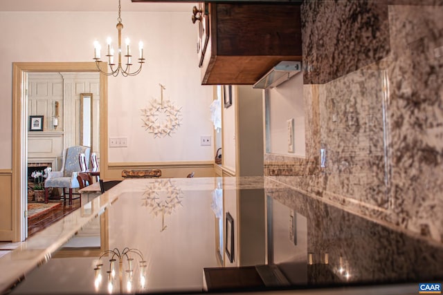 kitchen with a chandelier