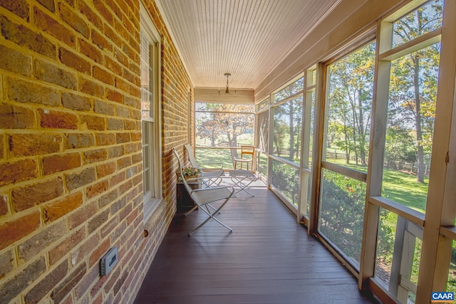 unfurnished sunroom with a healthy amount of sunlight