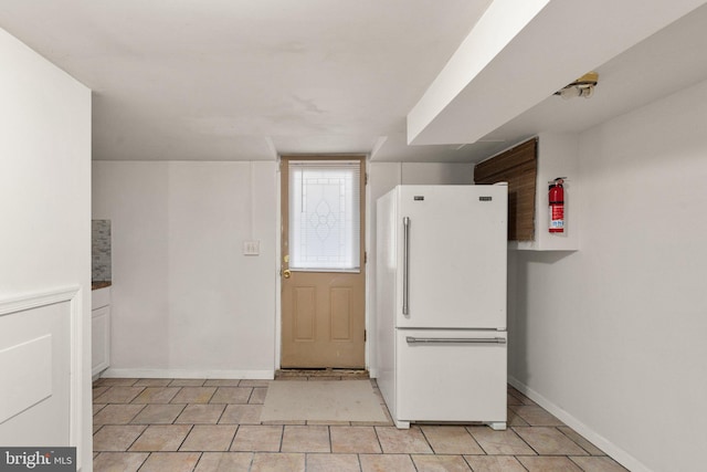 interior space featuring white refrigerator