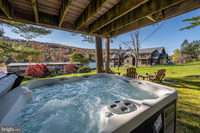 view of patio featuring a hot tub