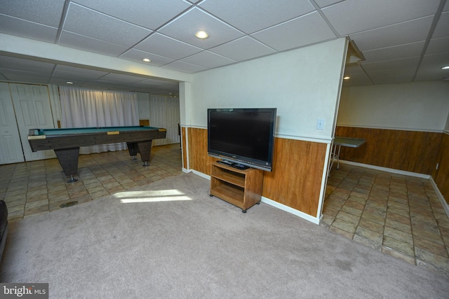 rec room featuring carpet flooring, a paneled ceiling, pool table, and wood walls