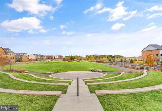 view of home's community with a lawn