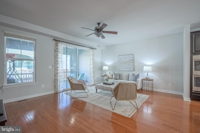 bedroom with light wood-type flooring and ceiling fan