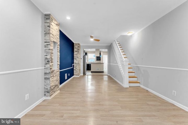 corridor featuring light wood-type flooring