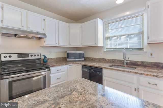 kitchen with white cabinetry, sink, stainless steel appliances, light stone countertops, and a textured ceiling