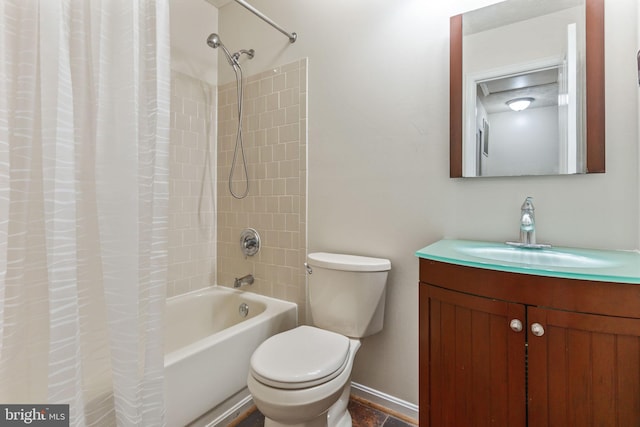 full bathroom featuring vanity, shower / tub combo, and toilet