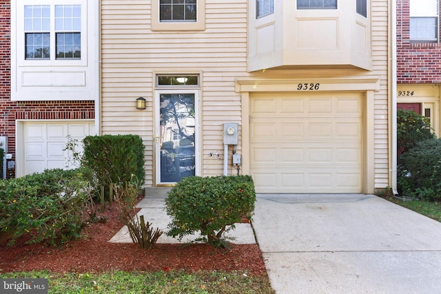 entrance to property with a garage