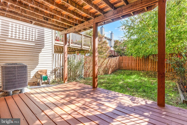 wooden deck featuring central air condition unit