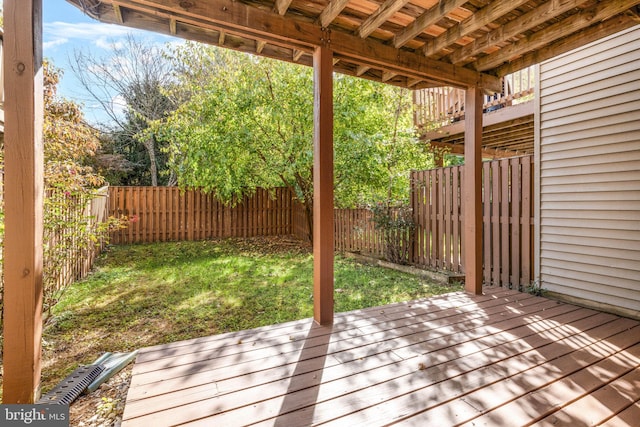 deck featuring a yard