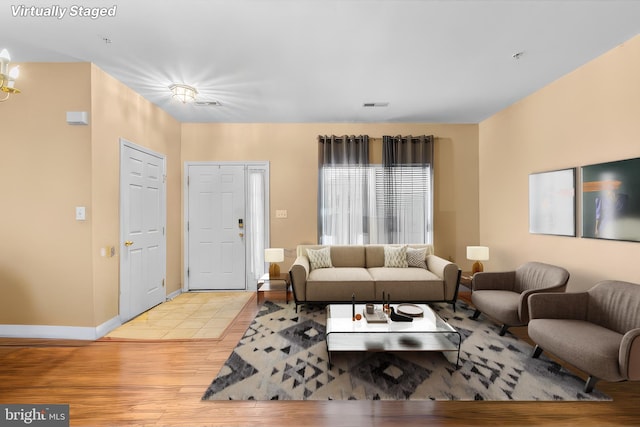 living room with light hardwood / wood-style flooring