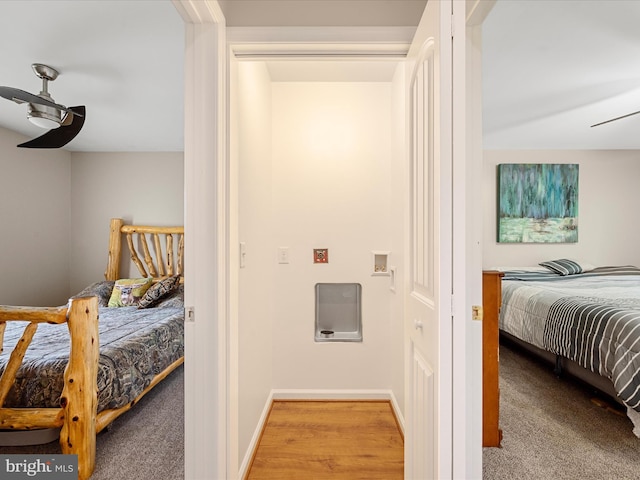 bedroom featuring light hardwood / wood-style floors and ceiling fan