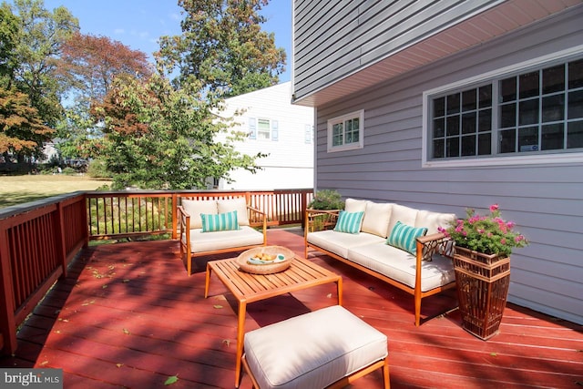 deck featuring outdoor lounge area