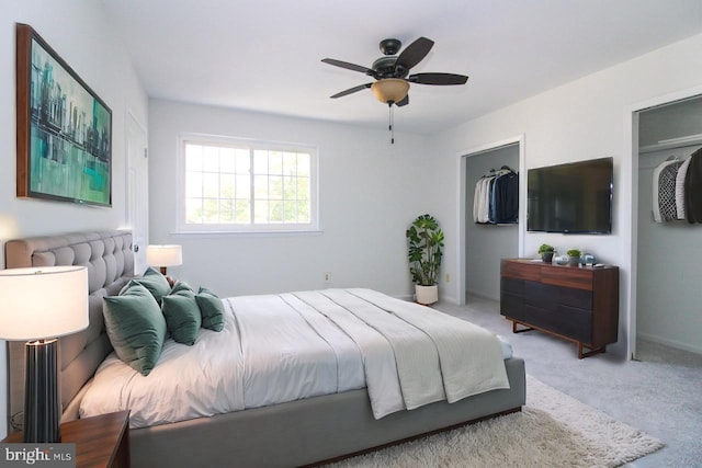 bedroom with light carpet, a closet, and ceiling fan