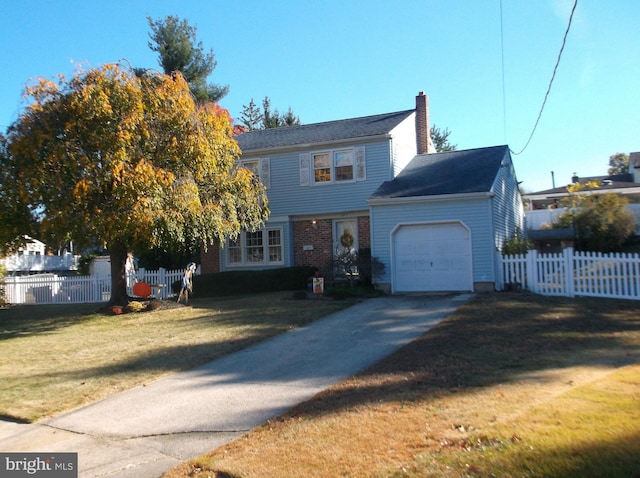 view of front facade featuring a garage and a front lawn