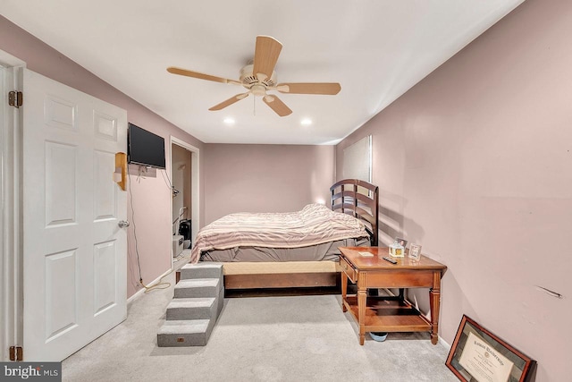 bedroom featuring light carpet and ceiling fan