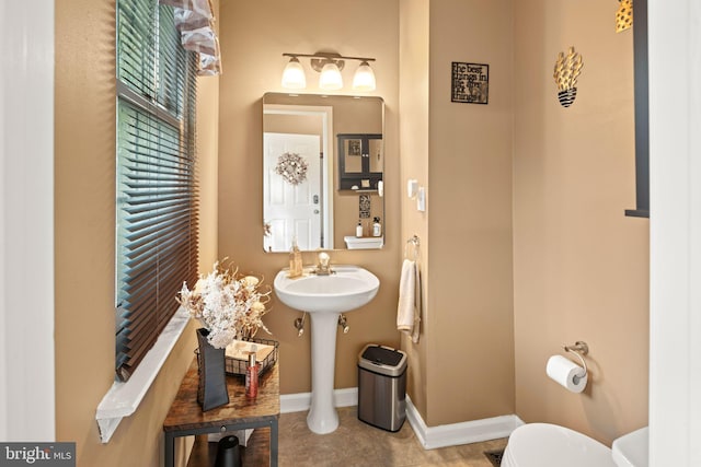 bathroom with sink and toilet