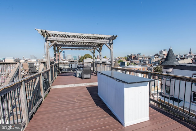 wooden terrace featuring a pergola