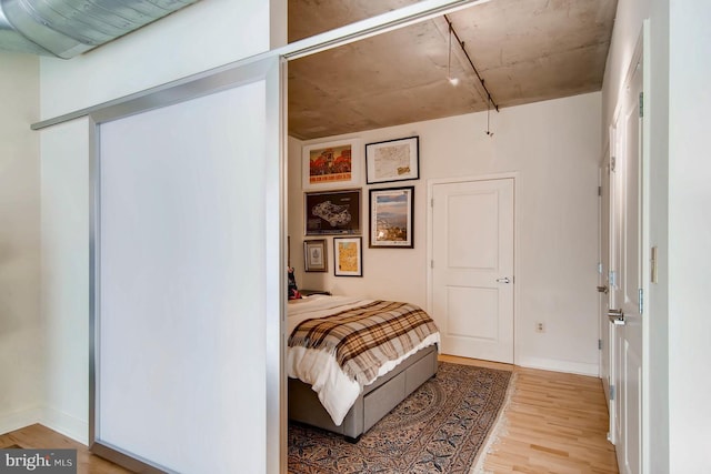 bedroom featuring hardwood / wood-style floors