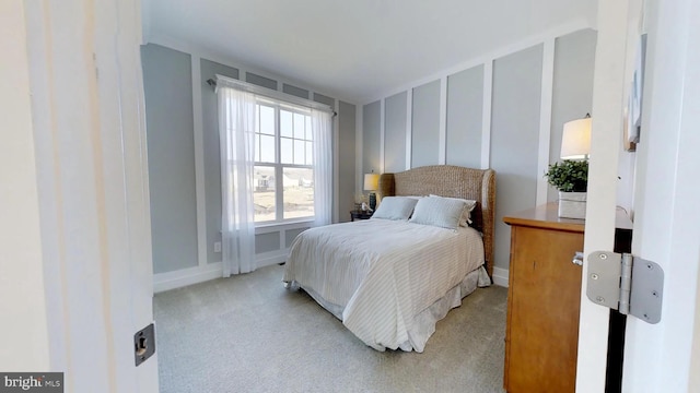 bedroom with light carpet