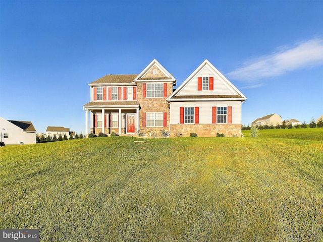 view of front of home with a front yard