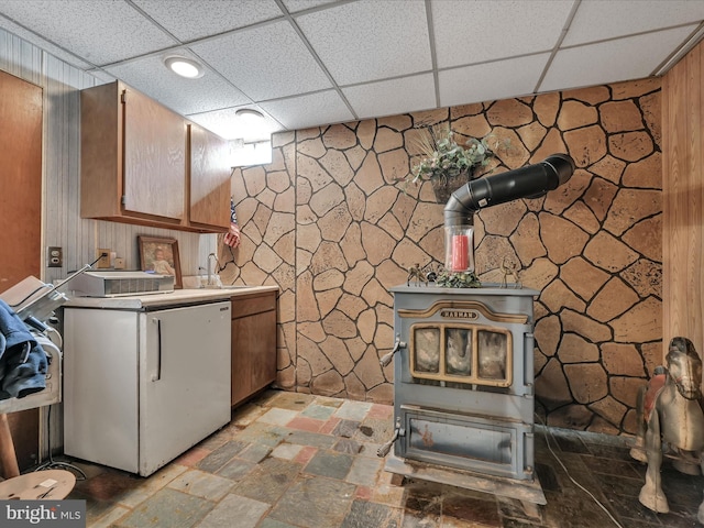 washroom with wood walls