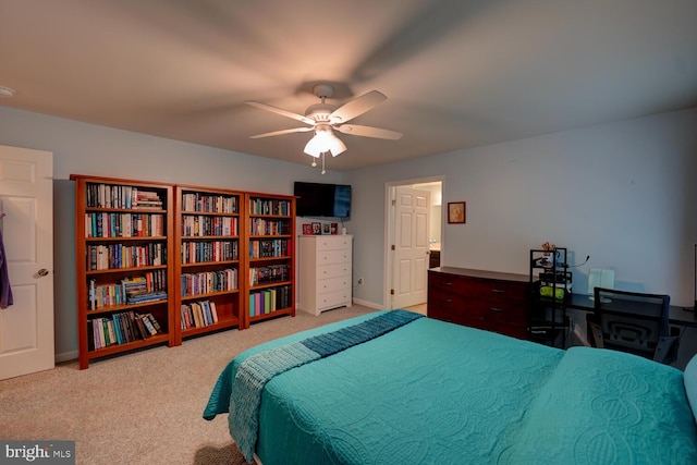 bedroom with light carpet and ceiling fan