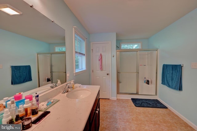 bathroom with walk in shower and plenty of natural light