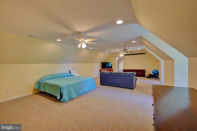 carpeted bedroom with lofted ceiling and ceiling fan