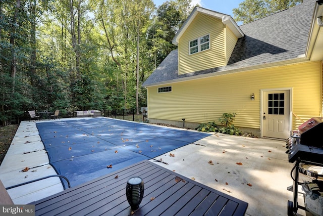 view of pool featuring a patio