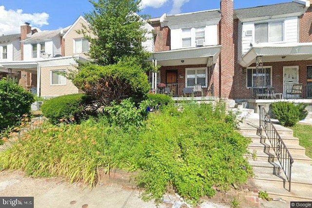 multi unit property featuring covered porch