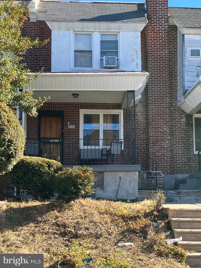 view of front of house featuring covered porch